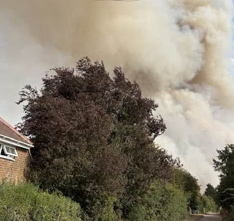Field fire threatens HBS site